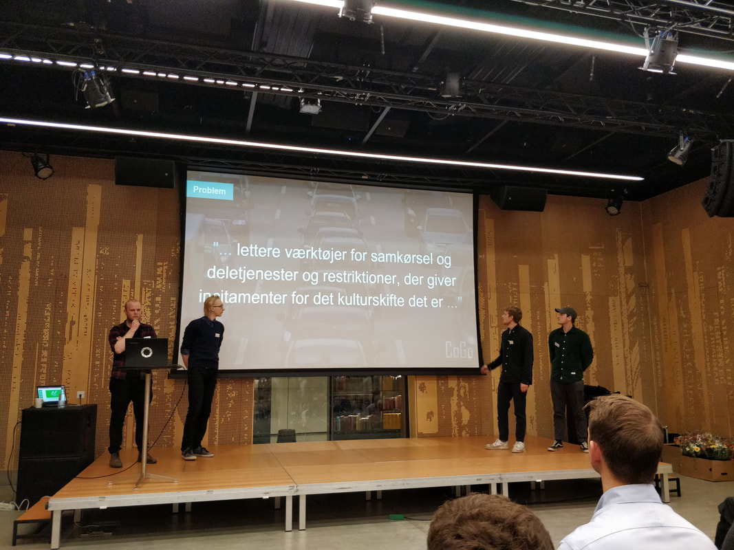 Picture of the team pitching our concept at the Open Data Challenge finale.