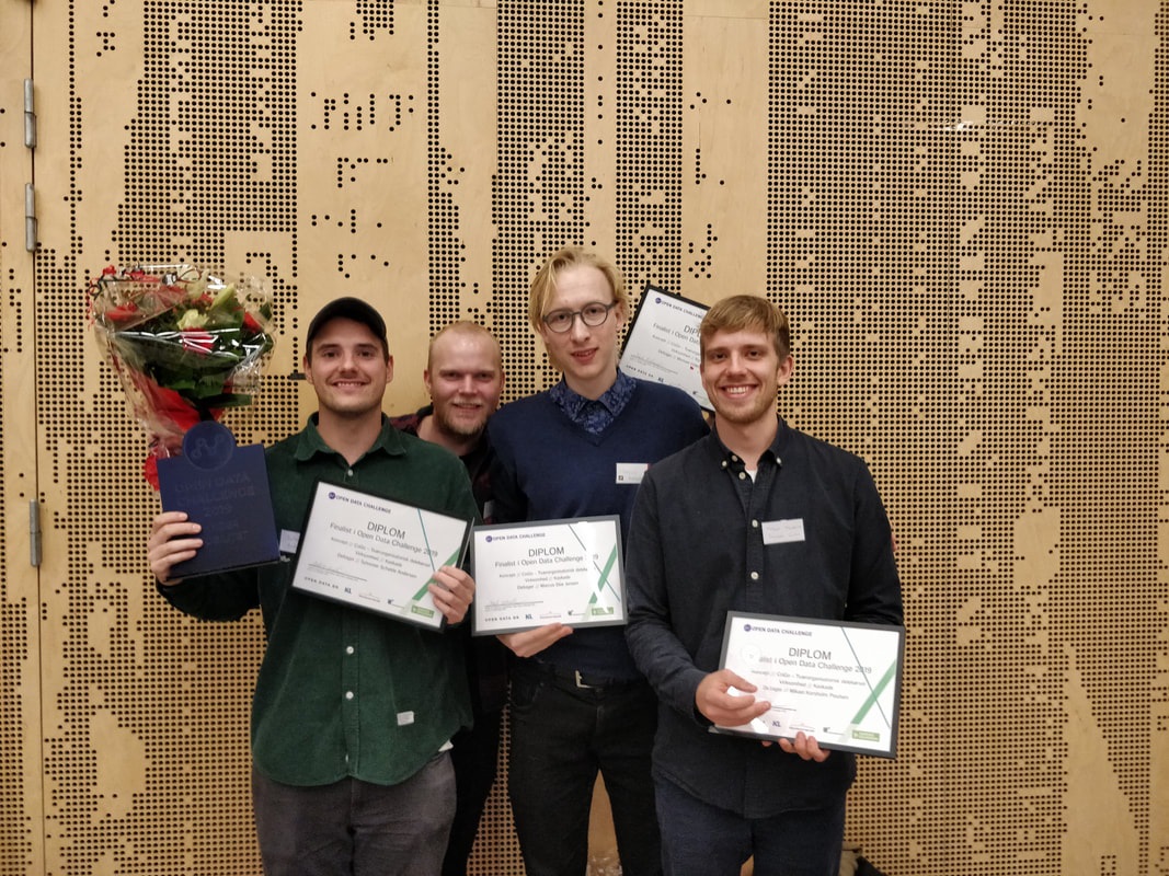 A group picture of the team with out diplomas after we won the Open Data Challenge.